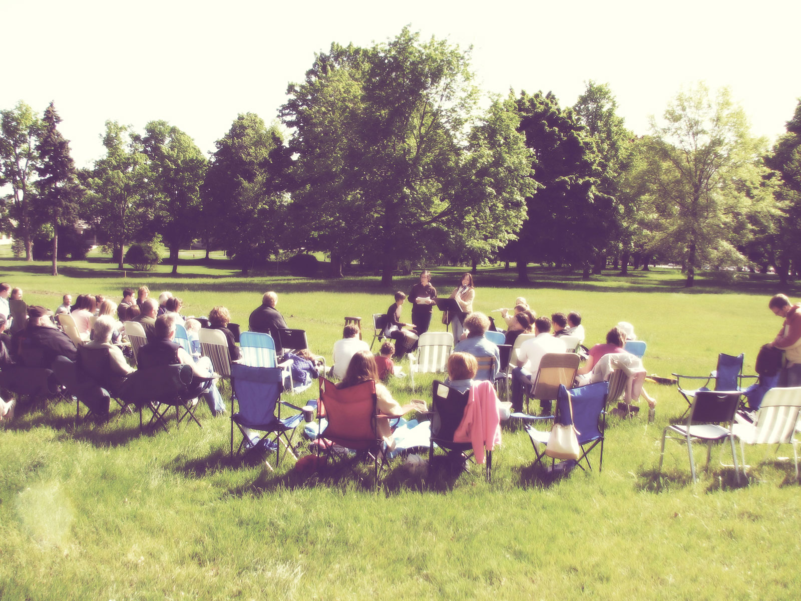 An intimate, outdoor concert gathering with Angela Josephine