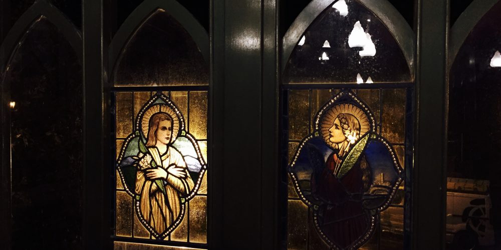 A photo of stained glass windows at Crawfordsburn Inn, N. Ireland for the poem The Crawfordsburning - by Angela Josephine